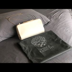 Vince Camuto white clutch with gold chain